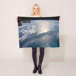 The International Spce Station Above The Atlantic Fleece Blanket