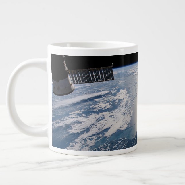 The International Spce Station Above The Atlantic Large Coffee Mug (Left)