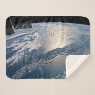 The International Spce Station Above The Atlantic Sherpa Blanket