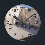 The Kotel - Hebrew Block Lettering Round Clock<br><div class="desc">The "Hebrew Essentials, " Consumer Marketplace offers a shopping experience as you will not find anywhere else. Our speciality is Hebrew,  and in our store your will find Hebrew in block,  script,  and Rashi script.  Tell your friends about us and send them our link:  http://www.zazzle.com/HebrewNames?rf=238549869542096443*  ENJOY YOUR VISIT!</div>