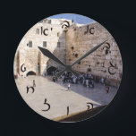 The Kotel - Hebrew Script Lettering Round Clock<br><div class="desc">The "Hebrew Essentials, " Consumer Marketplace offers a shopping experience as you will not find anywhere else. Our speciality is Hebrew,  and in our store your will find Hebrew in block,  script,  and Rashi script.  Tell your friends about us and send them our link:  http://www.zazzle.com/HebrewNames?rf=238549869542096443*  ENJOY YOUR VISIT!</div>