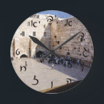 The Kotel - Hebrew Script Lettering Round Clock<br><div class="desc">The "Hebrew Essentials, " Consumer Marketplace offers a shopping experience as you will not find anywhere else. Our speciality is Hebrew,  and in our store your will find Hebrew in block,  script,  and Rashi script.  Tell your friends about us and send them our link:  http://www.zazzle.com/HebrewNames?rf=238549869542096443*  ENJOY YOUR VISIT!</div>