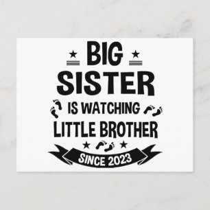 The little sister takes care of the big brother in holiday postcard
