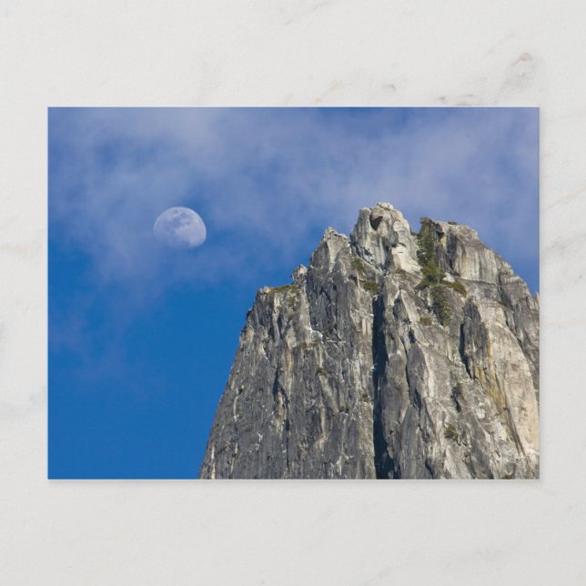 The moon rises and shines through the clouds postcard (Front)