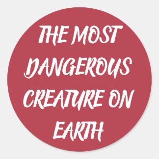 THE MOST DANGEROUS CREATURE ON EARTH CLASSIC ROUND STICKER