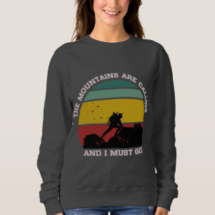 THE MOUNTAINS ARE CALLING AND I MUST GO HIKING SWEATSHIRT