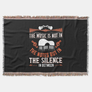 The Music Is Not In The Notes Throw Blanket