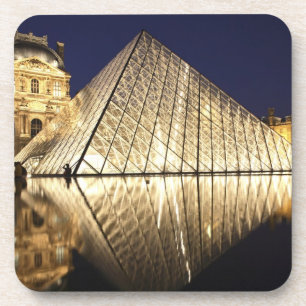 The night view of the glass Pyramid of Musee du Coaster