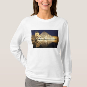 The night view of the glass Pyramid of Musee du T-Shirt