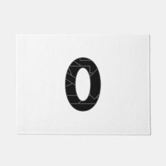 The number zero (0) in black doormat