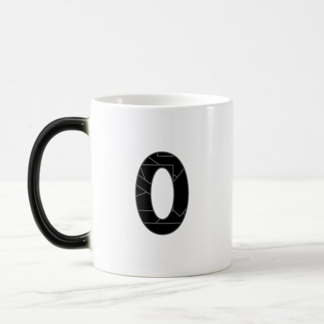 The number zero (0) in black magic mug (Left)