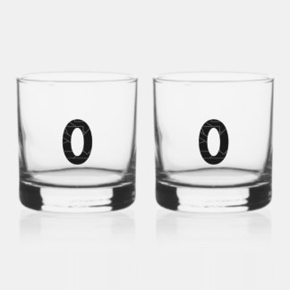 The number zero (0) in black whiskey glass