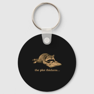 The plot thickens bookish racoon key ring