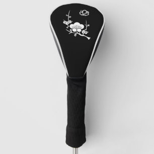 The plum-tree is in the middle of the shade golf head cover