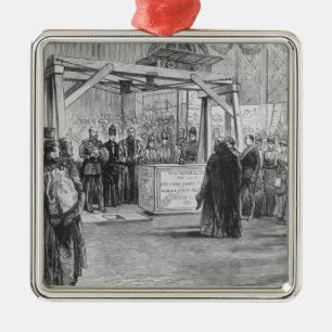 The Prince of Wales laying the Metal Tree Decoration