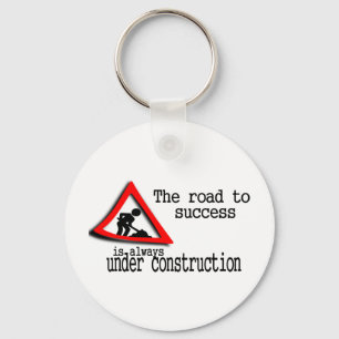 The road to success is always under construction key ring