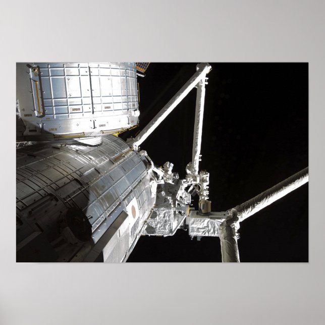 The robotic arm of the Japanese Experiment Modu 2 Poster (Front)