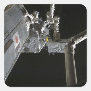 The robotic arm of the Japanese Experiment Modu Square Sticker