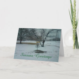 The Seasons Greetings disc golf basket in the snow Holiday Card