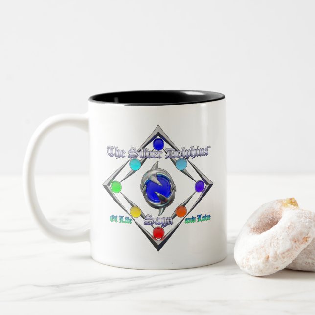 The Silver Dolphins Saga Of Life and Love Logo Cof Two-Tone Coffee Mug (With Donut)