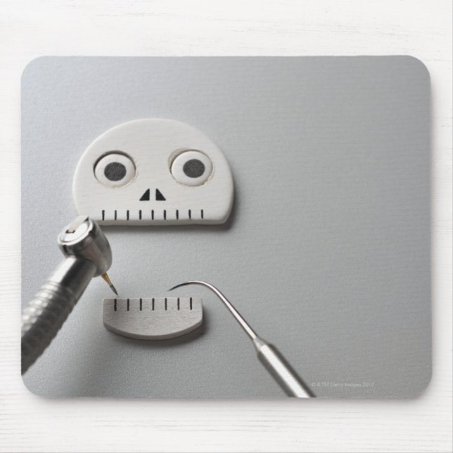 The skeleton which dental treatment is taken mouse pad (Front)