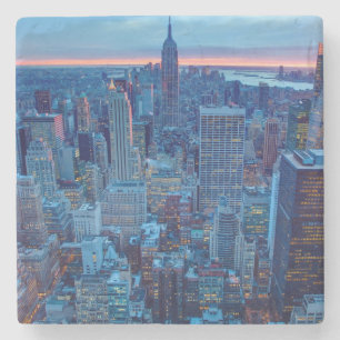The skyscrapers of Manhattan are lit Stone Coaster