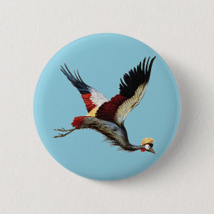The South African crowned crane in mid-flight 6 Cm Round Badge