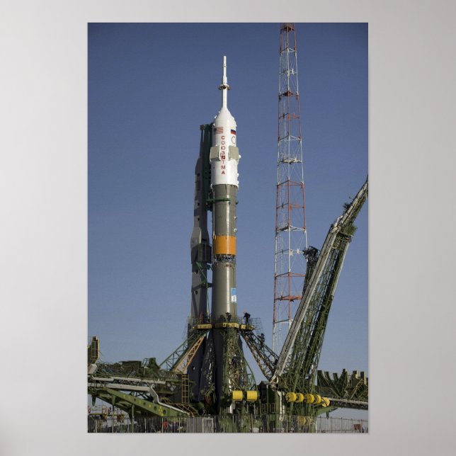 The Soyuz rocket is erected into position Poster (Front)