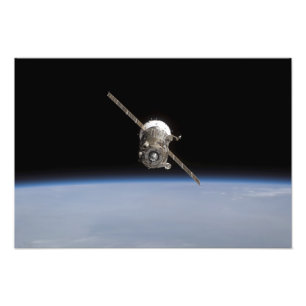 The Soyuz TMA-11 spacecraft above Earth's horiz Photo Print