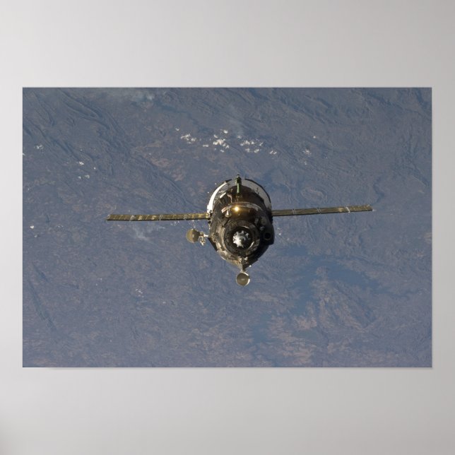 The Soyuz TMA-19 spacecraft Poster (Front)