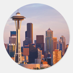 The Space Needle is a tower at dusk in Seattle Classic Round Sticker