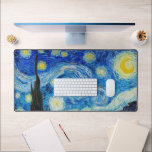 The Starry Night | Van Gogh | Desk Mat<br><div class="desc">The Starry Night is an oil-on-canvas painting by the Dutch Post-Impressionist painter Vincent van Gogh. Painted in June 1889,  it depicts the view from the east-facing window of his asylum room at Saint-Rémy-de-Provence,  just before sunrise,  with the addition of an imaginary village.</div>