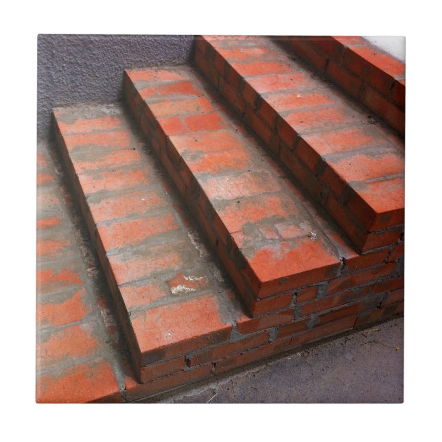 The steps of a new red brick staircase tile (Front)
