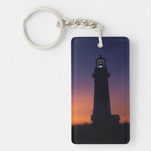 The sun ball drops down on the colourful horizon key ring