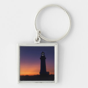 The sun ball drops down on the colourful horizon key ring