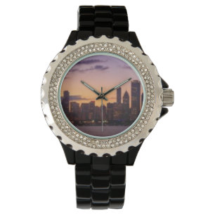 The sun sets over the Chicago skyline Watch