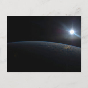 The Sun Setting Over Earth's Horizon. Postcard