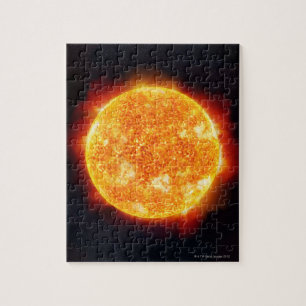 The Sun showing solar flares against a star Jigsaw Puzzle