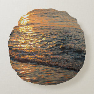 The sunset reflection on the beautiful ocean water round cushion