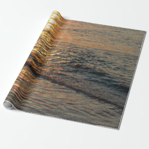 The sunset reflection on the beautiful ocean water wrapping paper