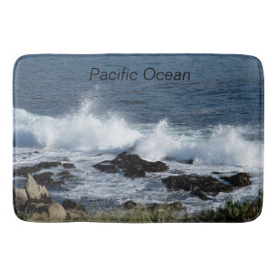 The surf of the Pacific Ocean Bath Mat