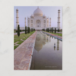 The Taj Mahal perfectly reflected in the still Postcard