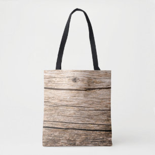 The texture of an old wooden log without bark with tote bag