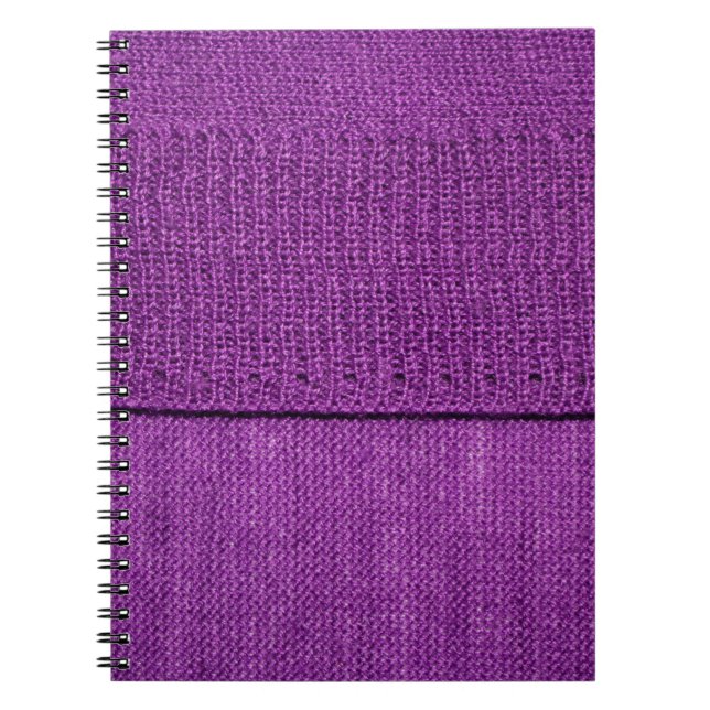 the texture of the knitted fabric, a plain purple  notebook (Front)
