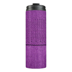 the texture of the knitted fabric, a plain purple thermal tumbler