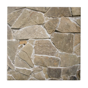 The texture of the walls of rough stones ceramic tile