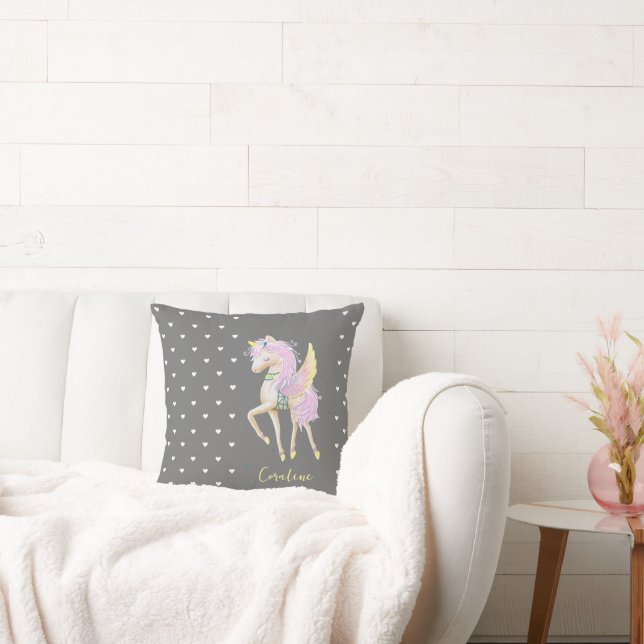 The Throw Pillow features a cute unicorn. (Couch)