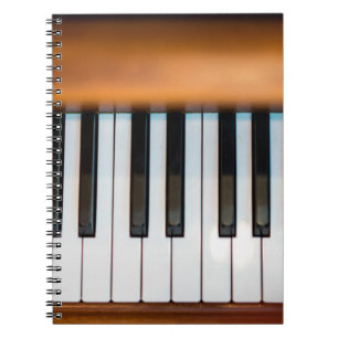 The top view of vintage key piano. abstract, antiq notebook