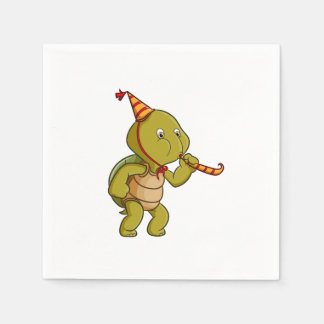 the turtle celebrating the birthday and blowing th napkin