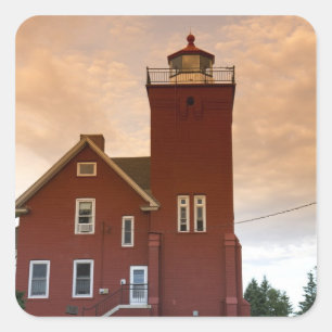 The Two Harbours Lighthouse overlooking Agate Bay Square Sticker